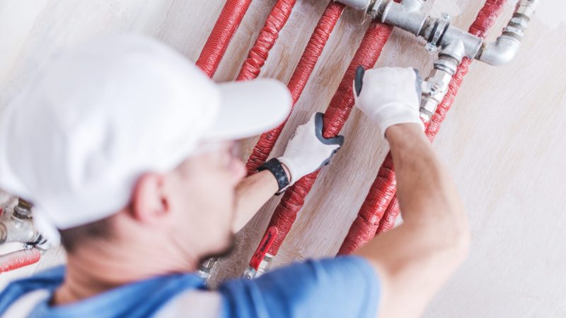 Hydraulic Worker Job. Caucasian Hydraulic Water Supply Technician Testing New House System.